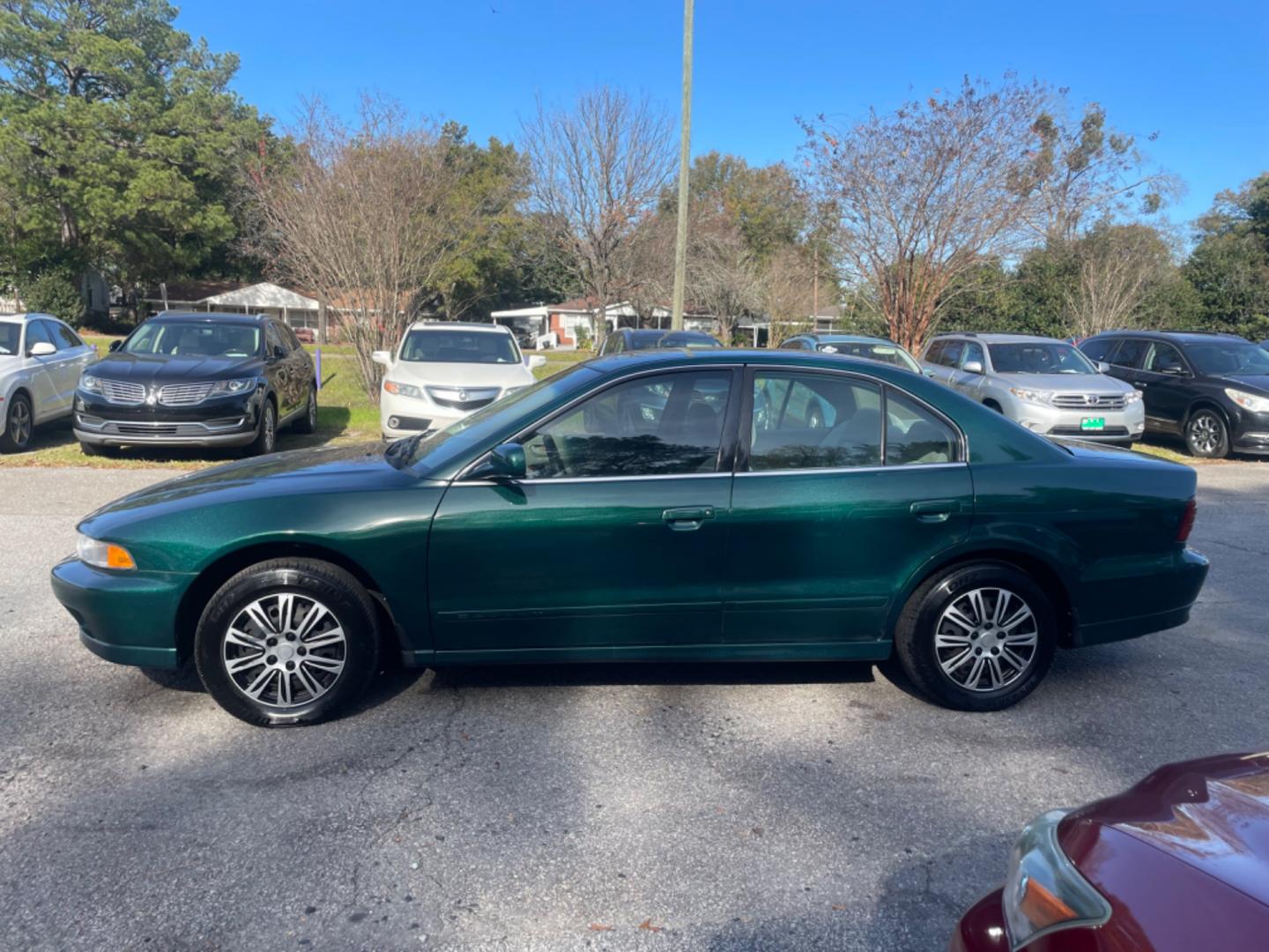 2001 GREEN MITSUBISHI GALANT ES (4A3AA46G31E) with an 2.4L engine, Automatic transmission, located at 5103 Dorchester Rd., Charleston, SC, 29418-5607, (843) 767-1122, 36.245171, -115.228050 - Shimmery Green Exterior, Clean Interior with AM/FM/AUX/USB, Power Windows, Power Locks, Power Mirrors. Runs Great! Only 92k miles!! Located at New Life Auto Sales! 2023 WINNER for Post & Courier's Charleston's Choice Pre-owned Car Dealer AND 2018-2023 Top 5 Finalist for Charleston City Paper's BEST - Photo#3